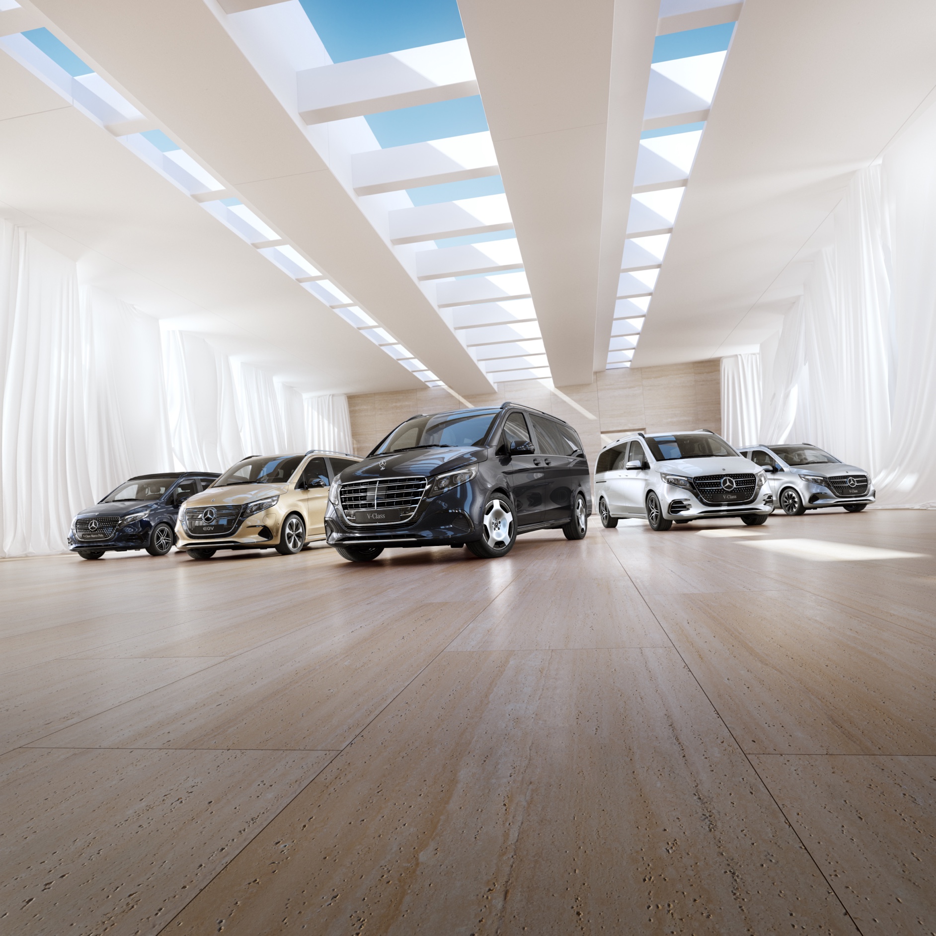 Comfort | EQV | Mercedes-Benz Vans De Mercedes-Benz bestelwagen- en campermodellen staan in een showroom.