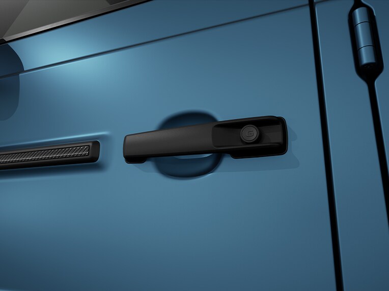MANUFAKTUR-logopakket in zwart in de Mercedes-Benz G-Klasse.
