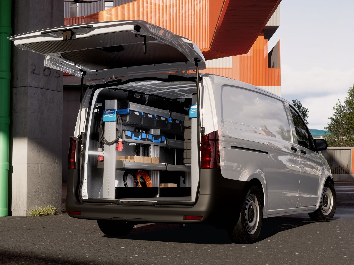 Mercedes-Benz bestelwagen met professionele werkplaatsombouw. De open laadruimte is voorzien van rekkensystemen en bakken voor efficiënte service-, onderhouds- en handelswerkzaamheden in een stedelijke omgeving.