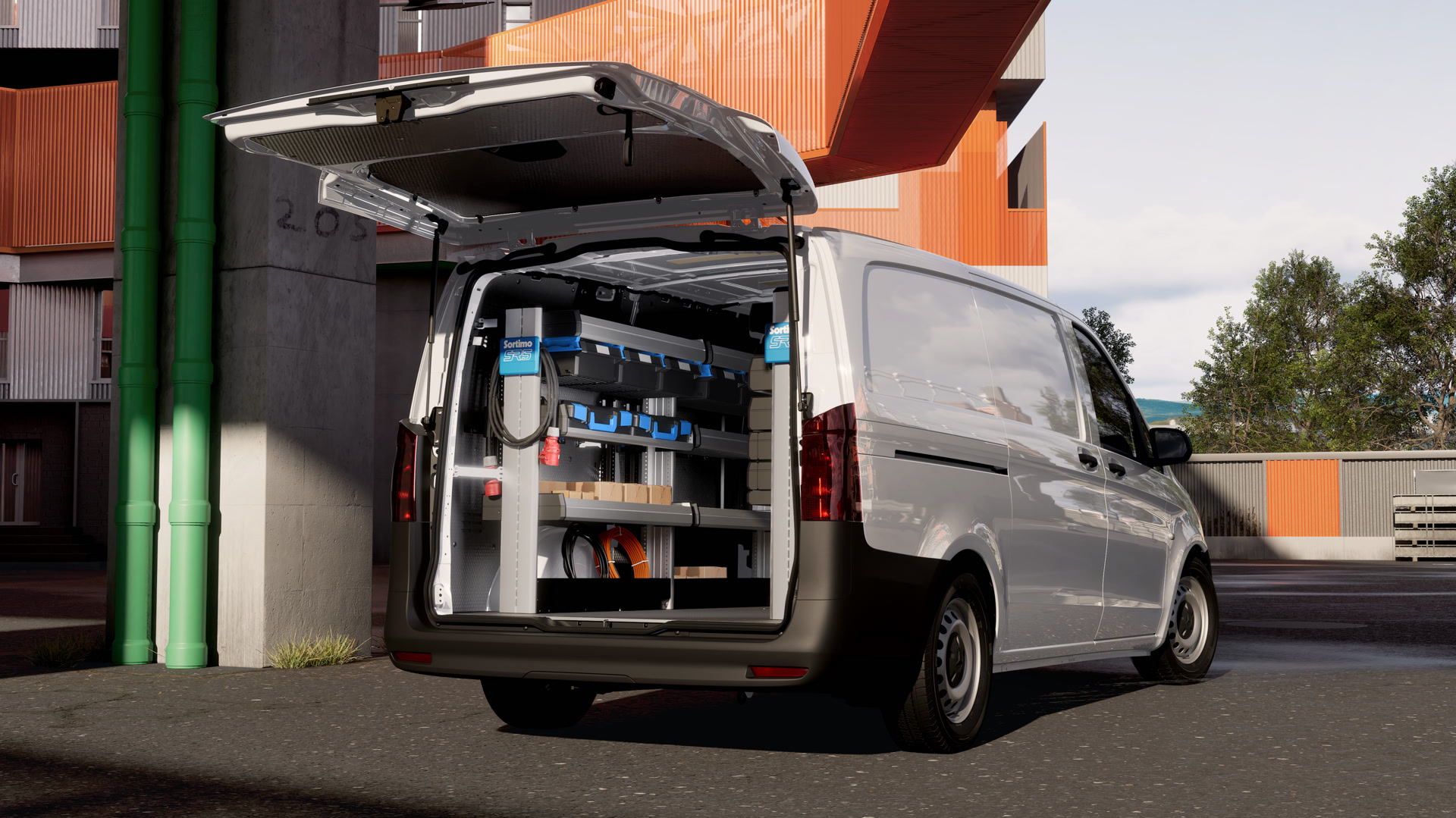Mercedes-Benz Vito met voertuiguitrusting van Sortimo. Mercedes-Benz bestelwagen met professionele werkplaatsombouw. De open laadruimte is voorzien van rekkensystemen en bakken voor efficiënte service-, onderhouds- en handelswerkzaamheden in een stedelijke omgeving.