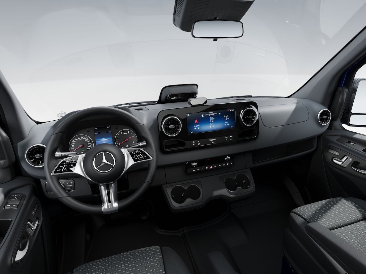 Het bestuurderscompartiment van de Mercedes-Benz Sprinter gesloten bestelwagen.