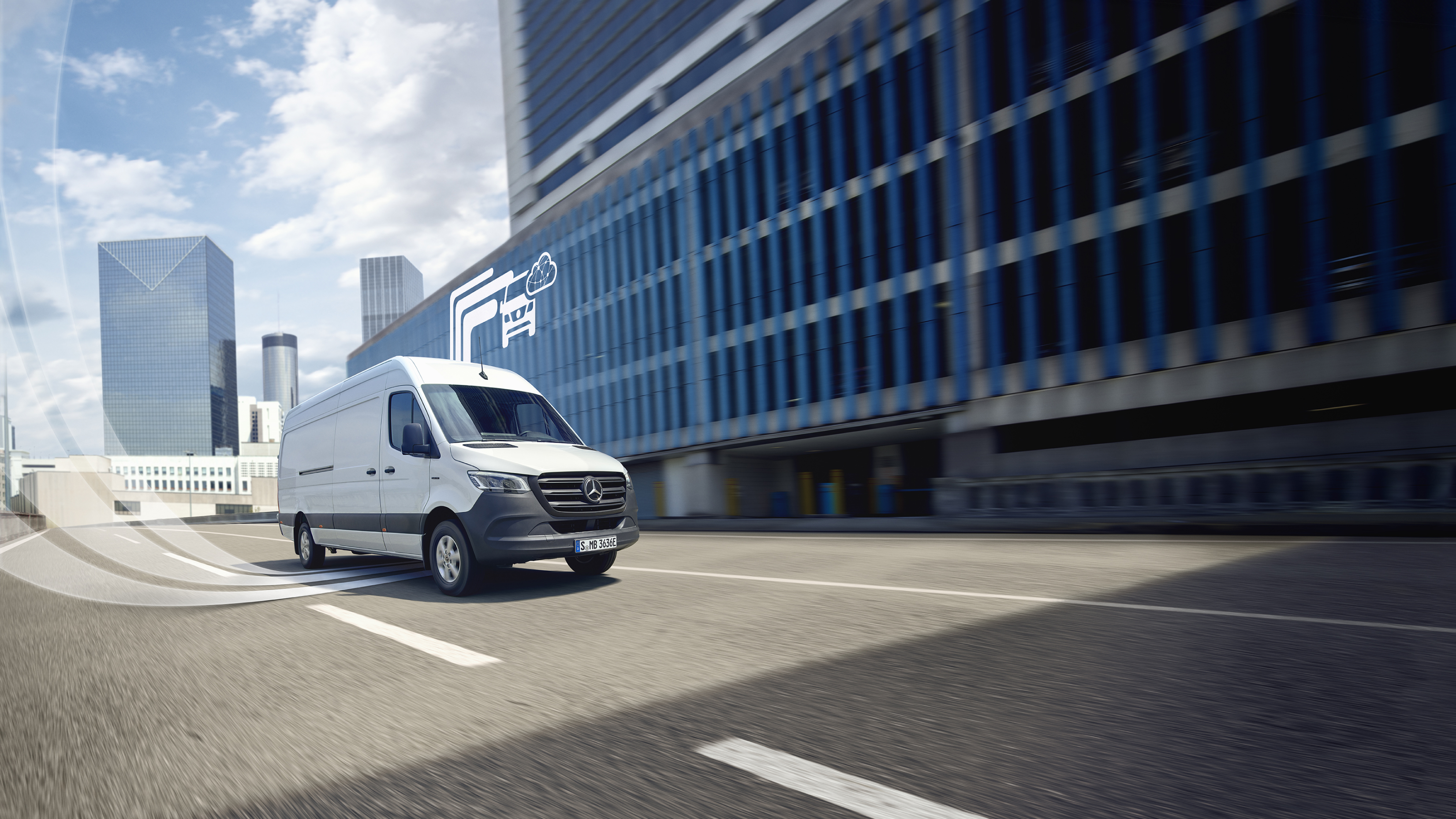 Digitale extra's | Mercedes-Benz Een Mercedes-Benz bestelwagen met grafische elementen die de digitale extra's voorstellen.