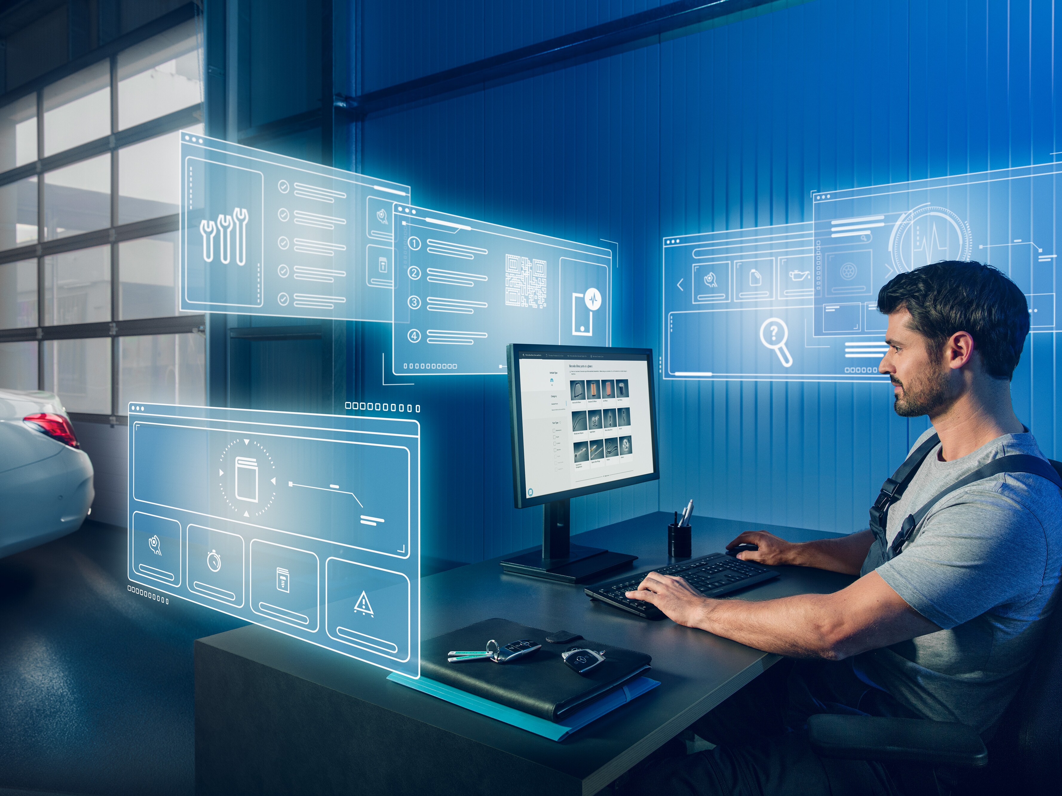 Monteur zoekt op computer naar Mercedes-Benz originele onderdelen in de onderdelencatalogus.